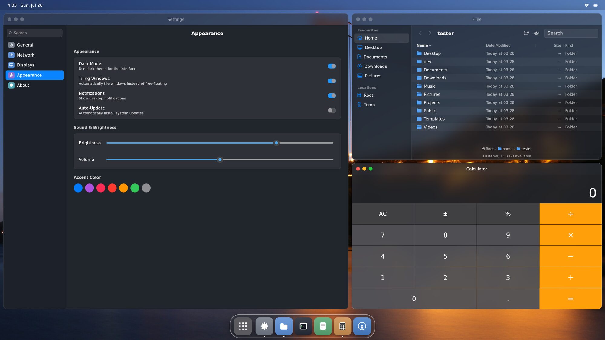 The Starling desktop with tiling enabled: Settings holds the master pane on the left, showing the Tiling Windows switch turned on, with Files and Calculator stacked down the right half.